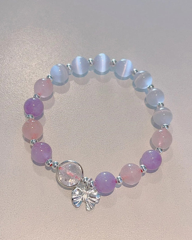 Bracelet imitation œil de chat cristal de papillon