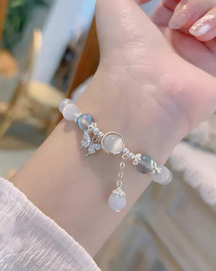 Bracelet imitation œil de chat cristal de papillon