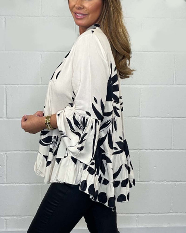 Blouse imprimée à manches cloche et boutons
