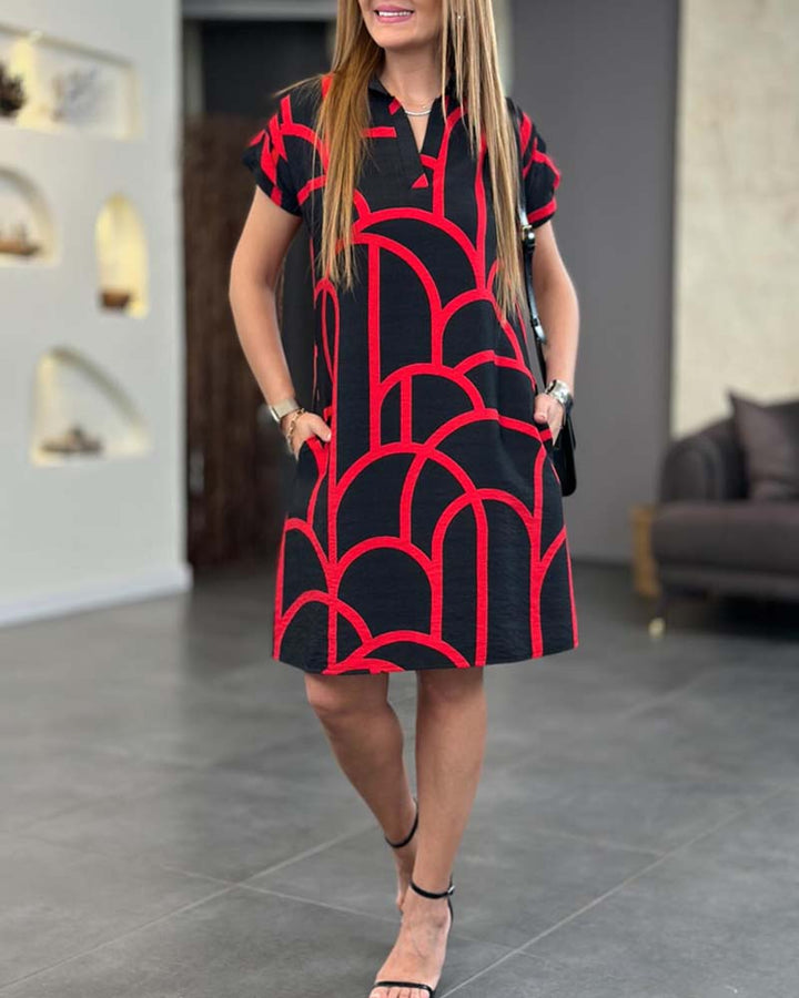 Robe midi imprimée à manches courtes et ligne de revers