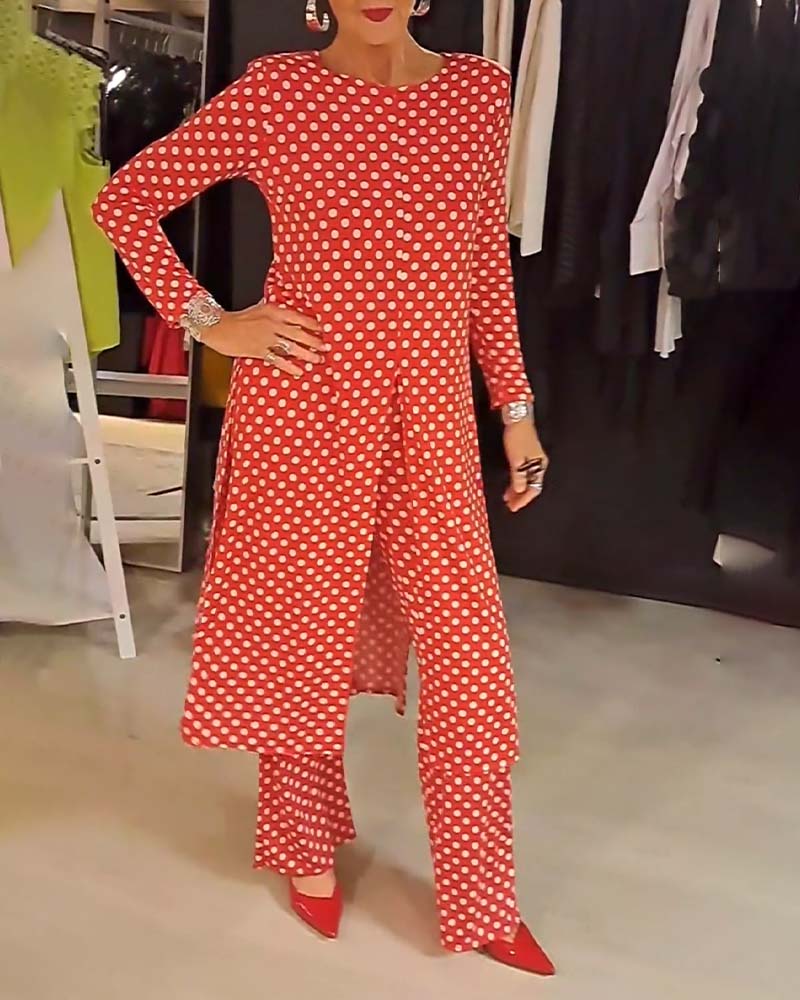 Costume élégant fendu à pois