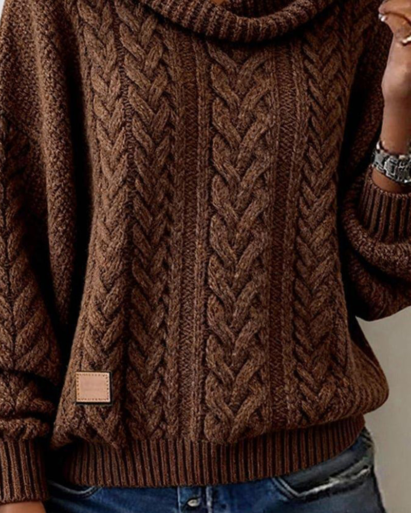 Pull en maille torsadée unie
