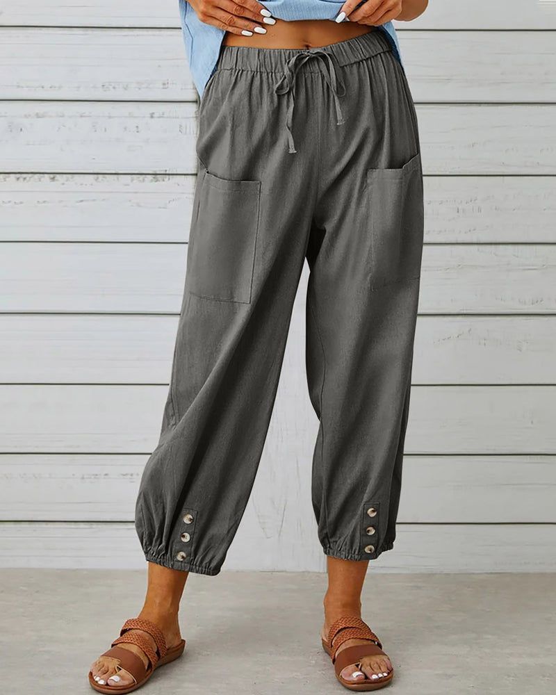 Pantalon taille haute bouton neuf points