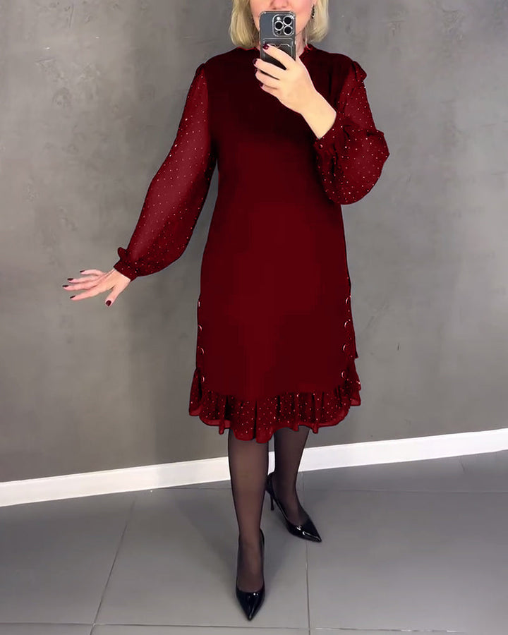 Robe élégante à pois et manches longues