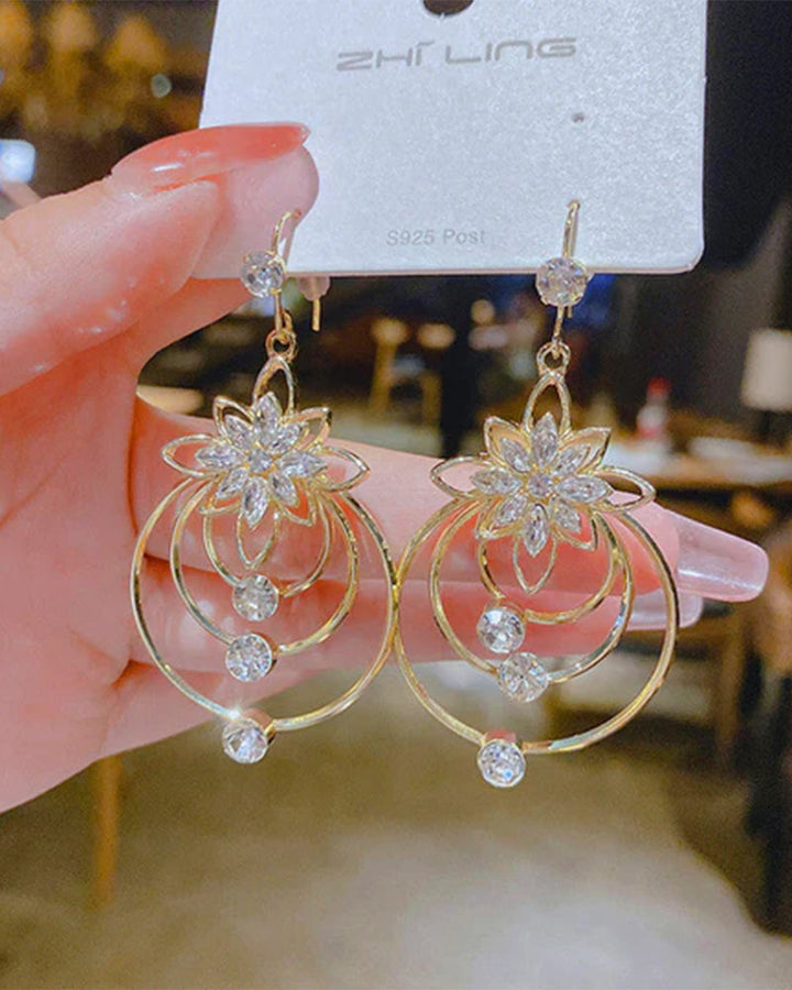 Boucles d'oreilles trois créoles lotus en cristal