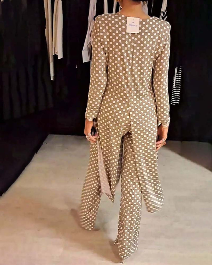 Costume élégant fendu à pois