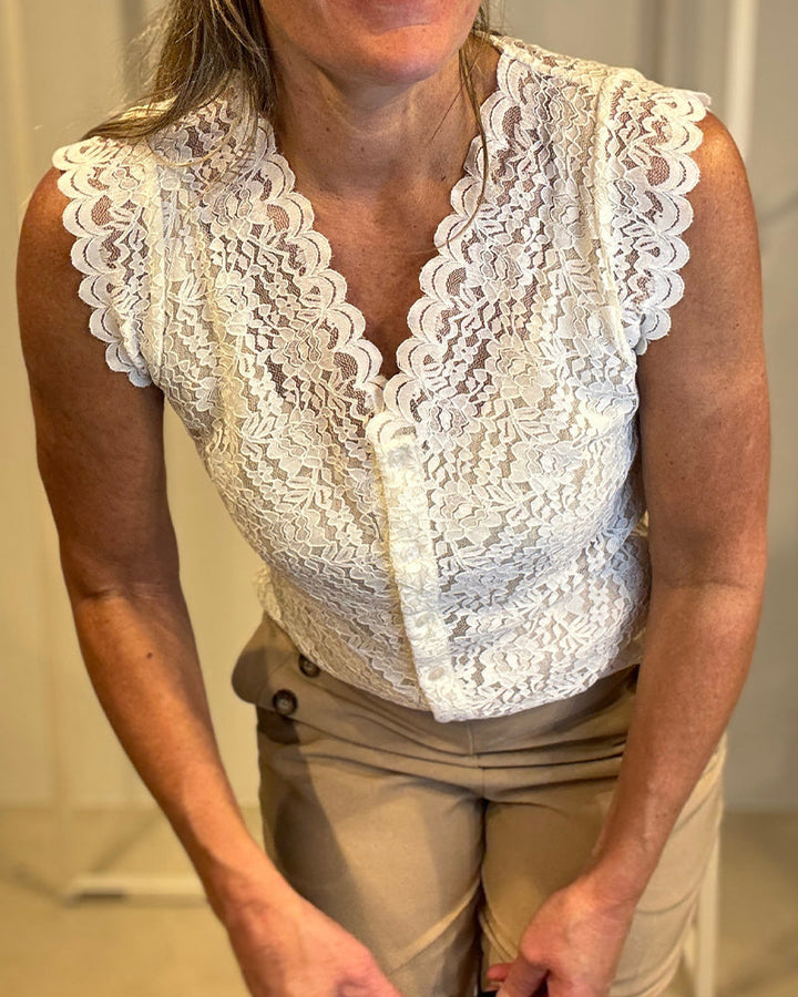 Débardeur élégant sans manches en dentelle avec col en V