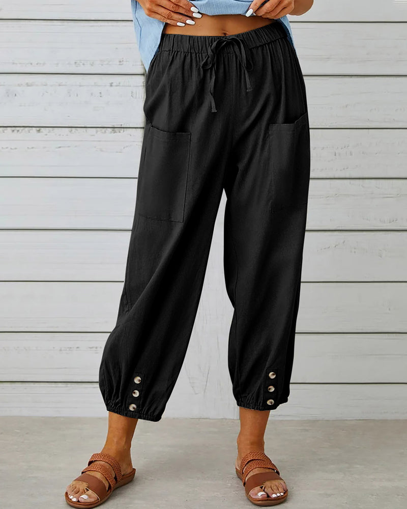 Pantalon taille haute bouton neuf points
