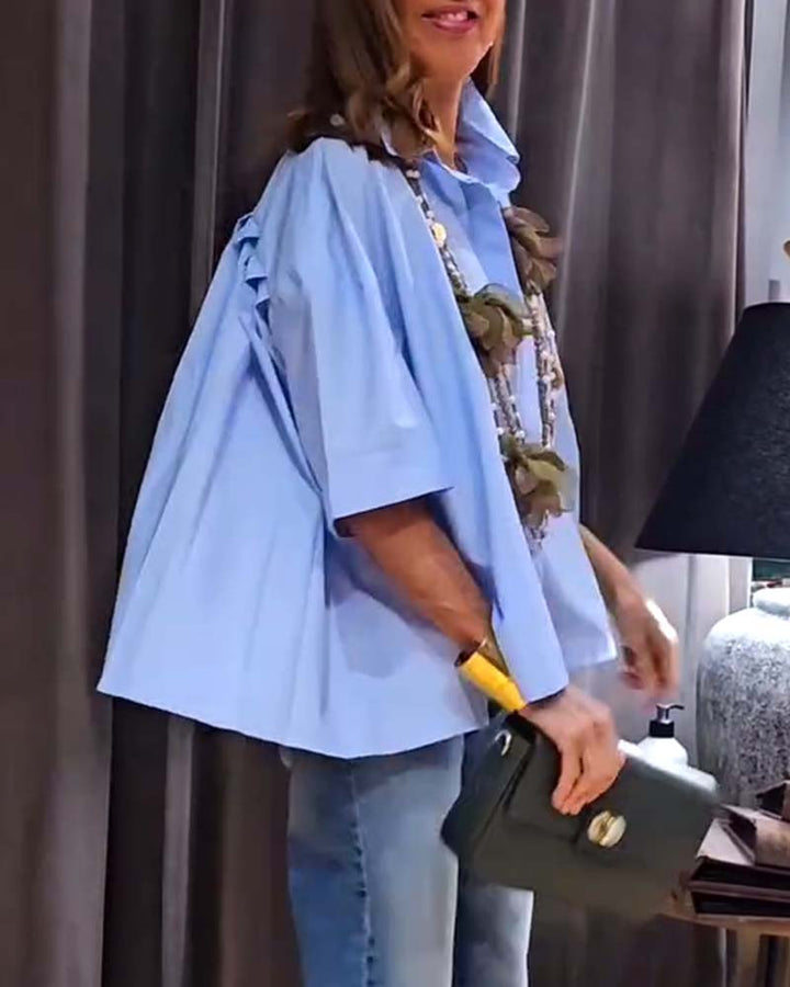 Chemise décontractée à poches plissées de couleur unie