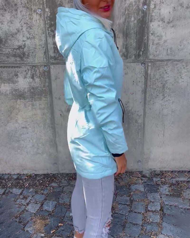 Manteau à fermeture éclair et cordon de serrage