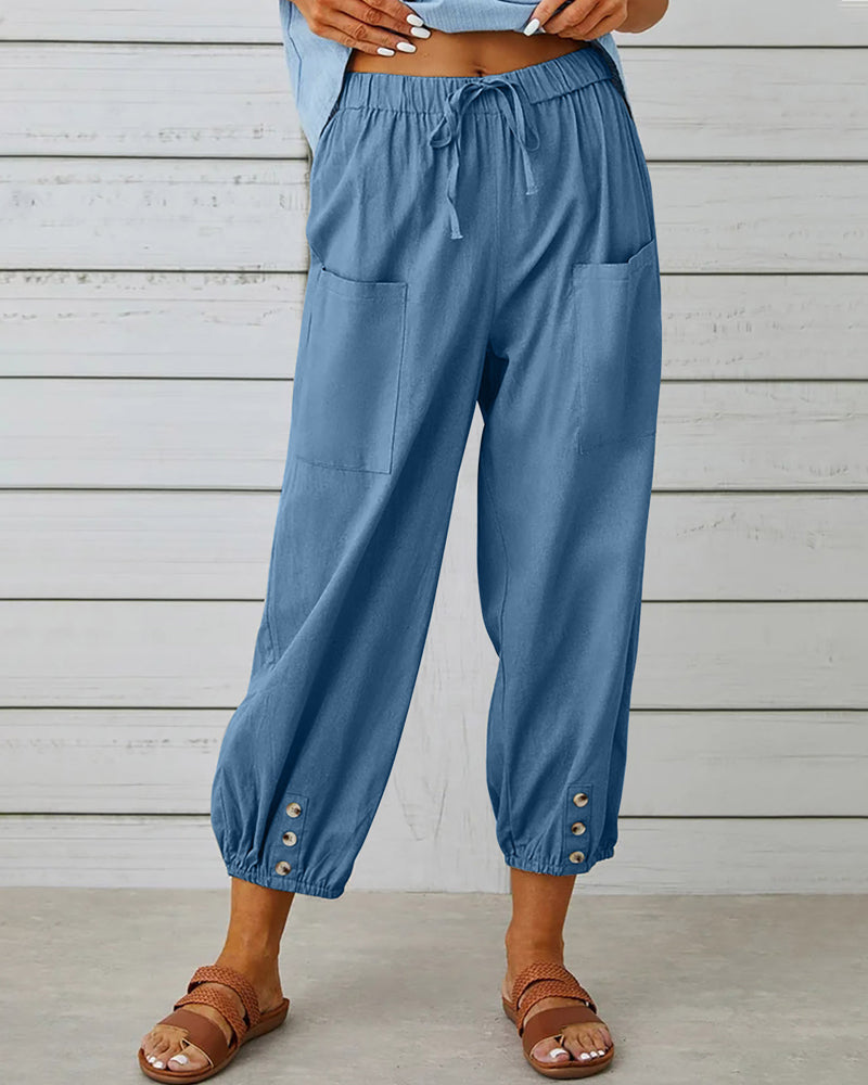 Pantalon taille haute bouton neuf points