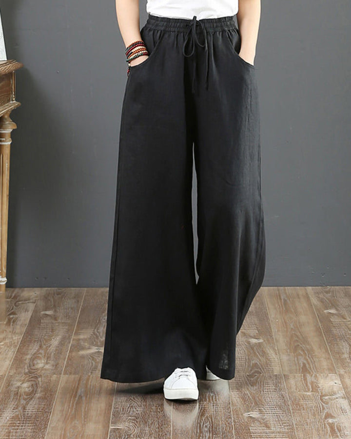 Pantalon large taille haute de couleur unie