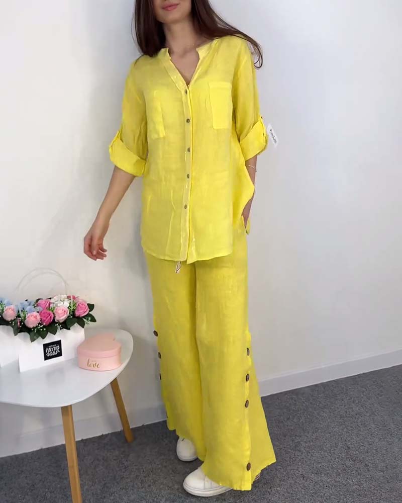 Ensemble chemisier et pantalon large en dentelle avec poche boutonnée et couleur unie