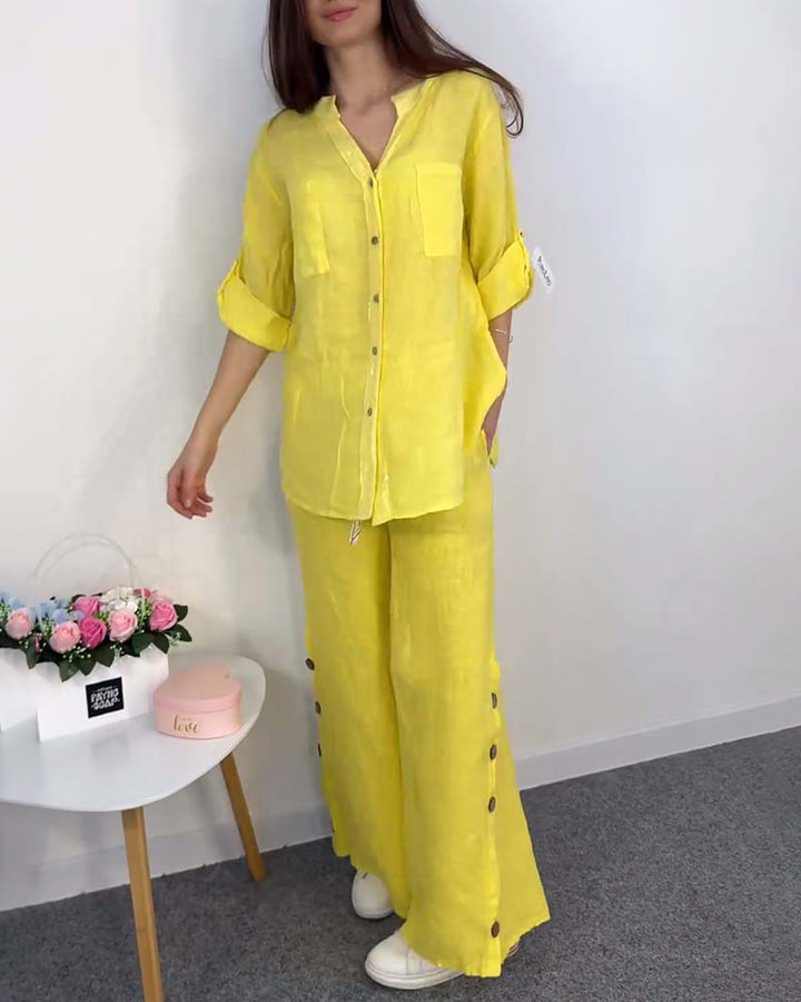 Ensemble chemisier et pantalon large en dentelle avec poche boutonnée et couleur unie