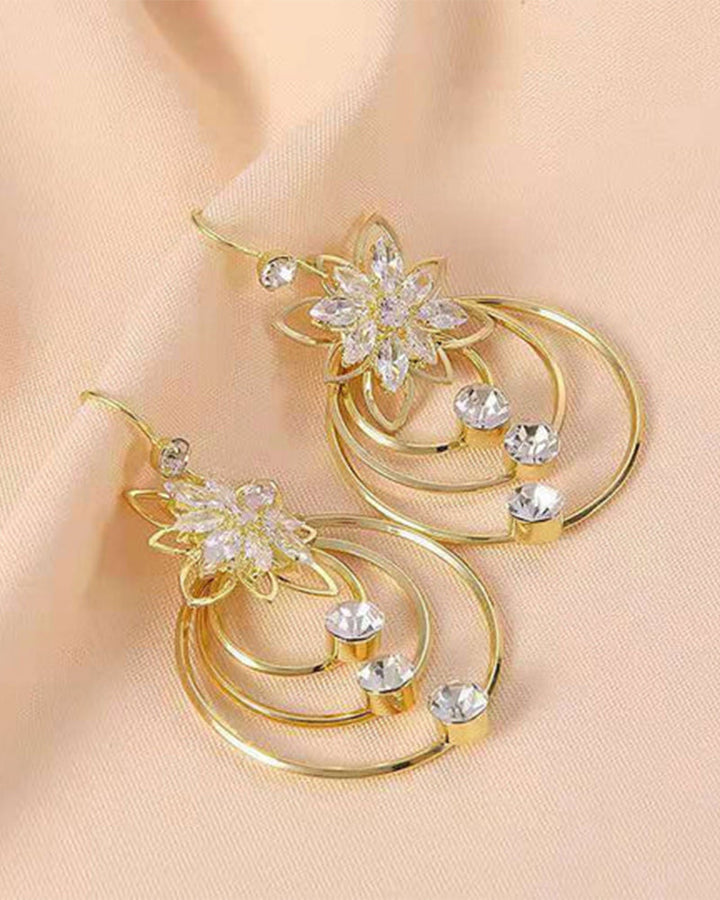 Boucles d'oreilles trois créoles lotus en cristal