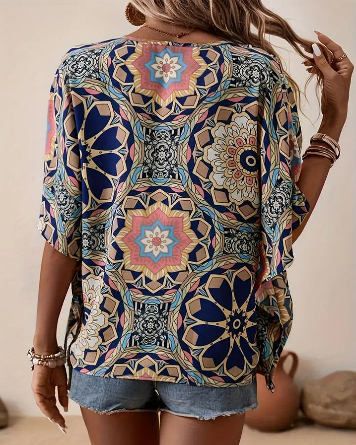 Blouse à demi-manches boutons avec col en V et imprimé rétro