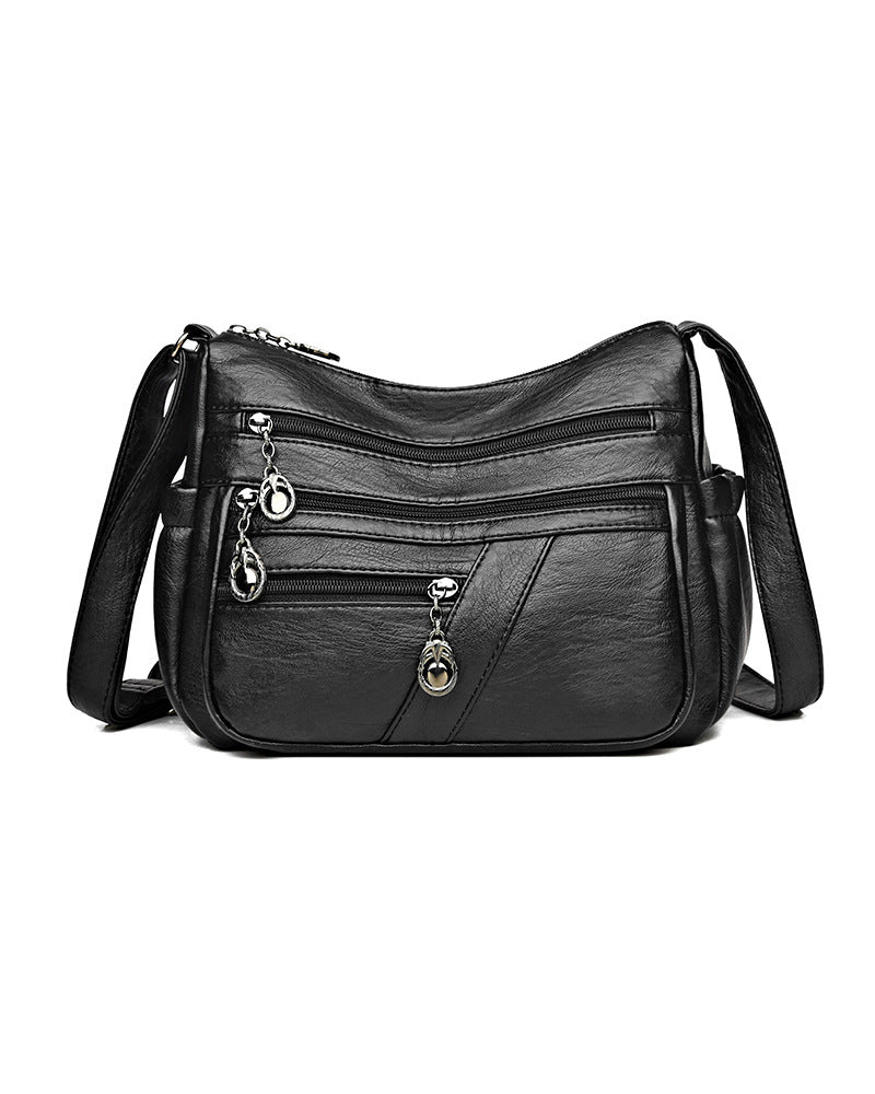 Sac bandoulière en cuir souple avec multipoches