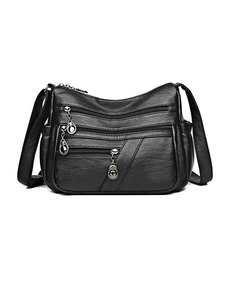 Sac bandoulière en cuir souple avec multipoches