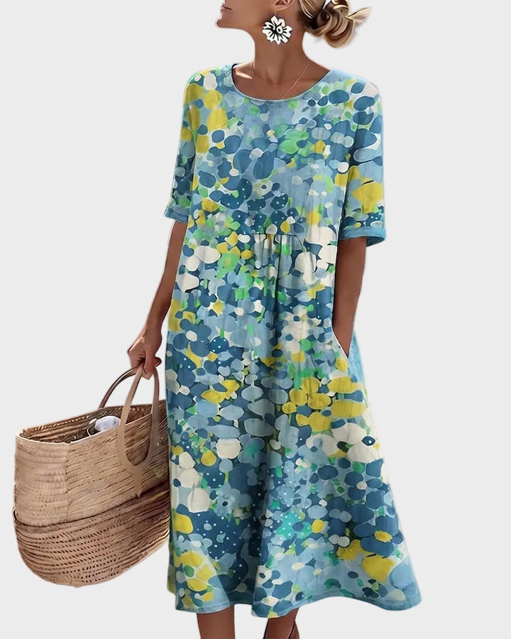 Élise | Robe midi fluide et légère à motif floral