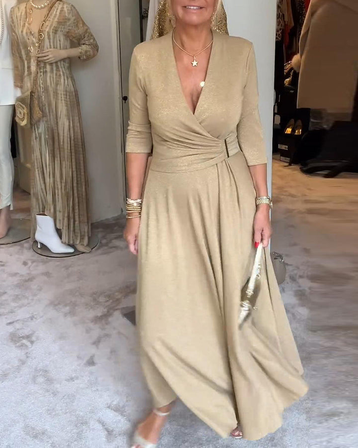 Robe élégante de couleur unie avec col en V et manches trois-quarts