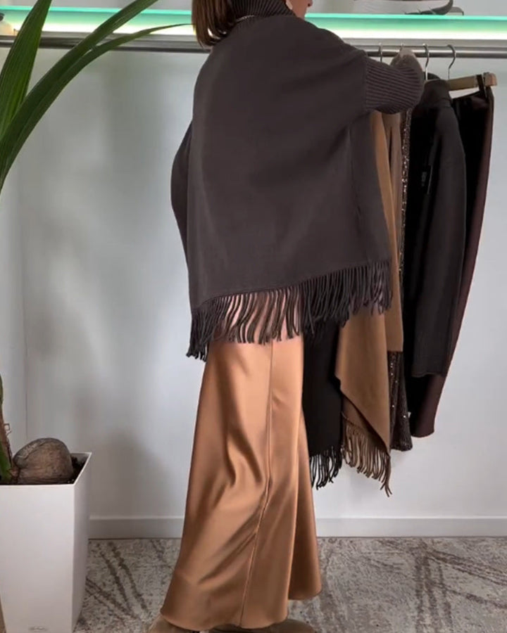 Pull à col roulé et franges de couleur unie