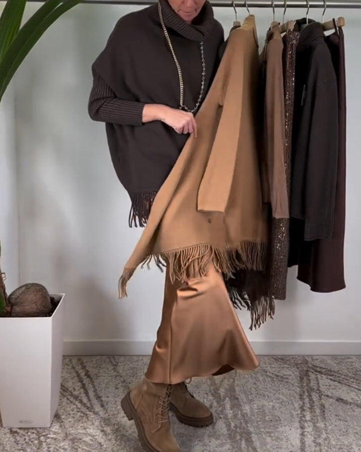 Pull à col roulé et franges de couleur unie